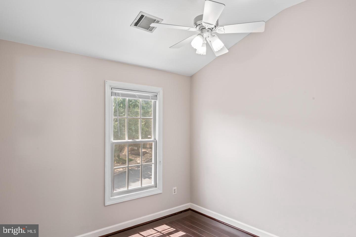 19893 Upland Terrace Ashburn, VA 20147 - Photo 24 of 29 an empty room with windows and fan