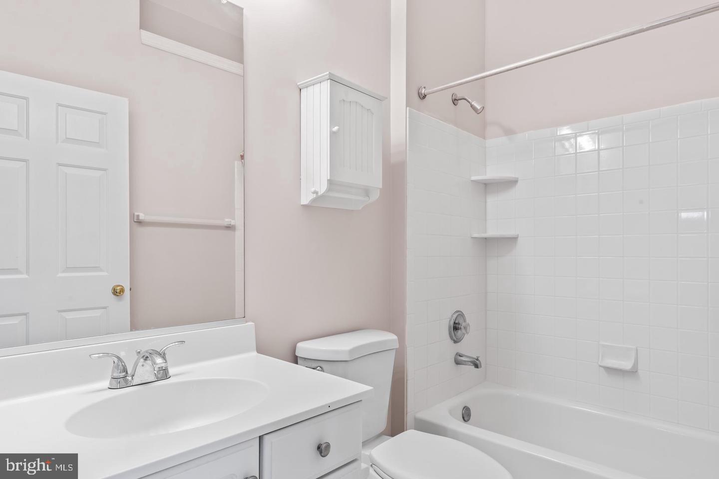 19893 Upland Terrace Ashburn, VA 20147 - Photo 25 of 29 a bathroom with a sink toilet and shower