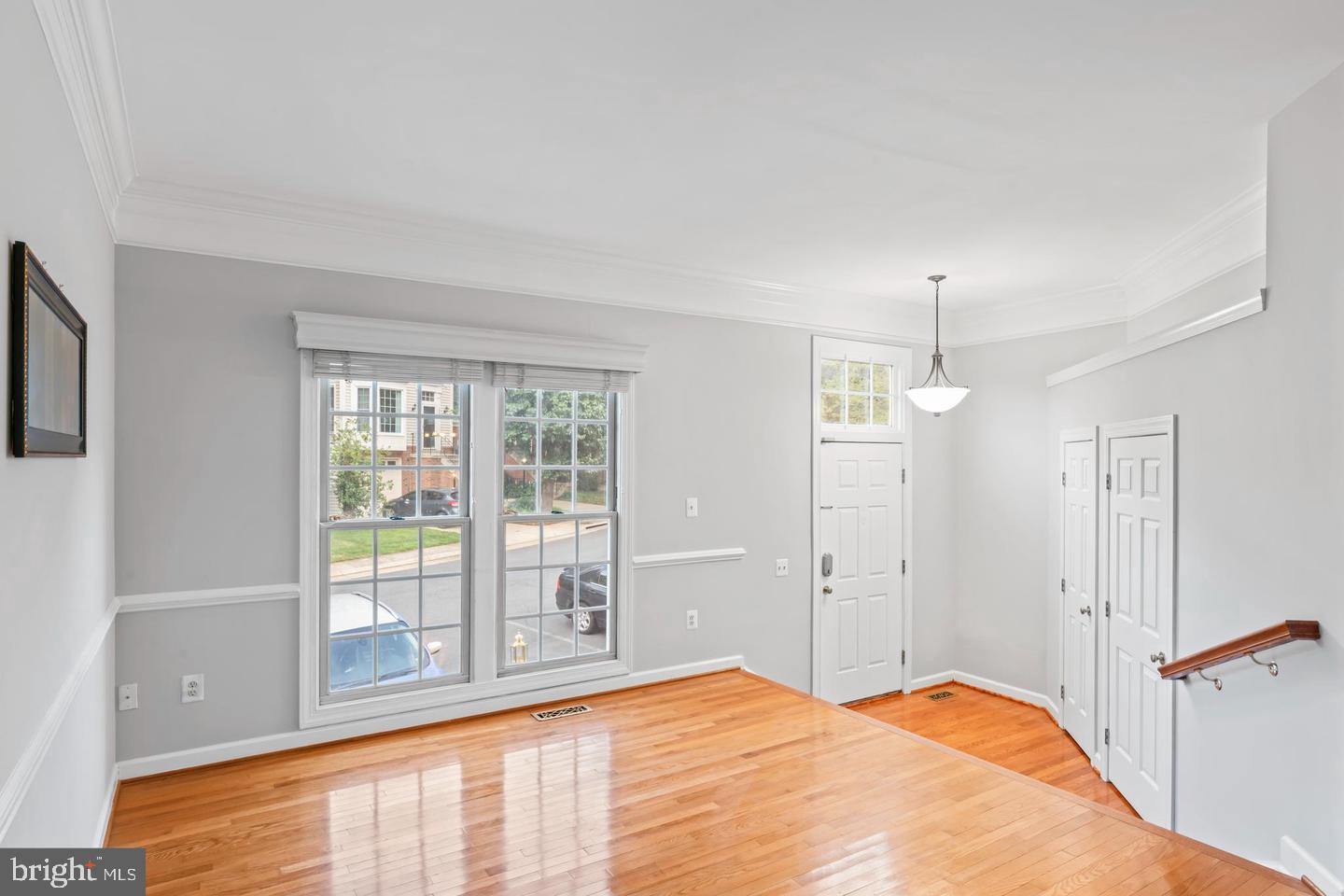 19893 Upland Terrace Ashburn, VA 20147 - Photo 4 of 29 a bedroom with a bed and a window