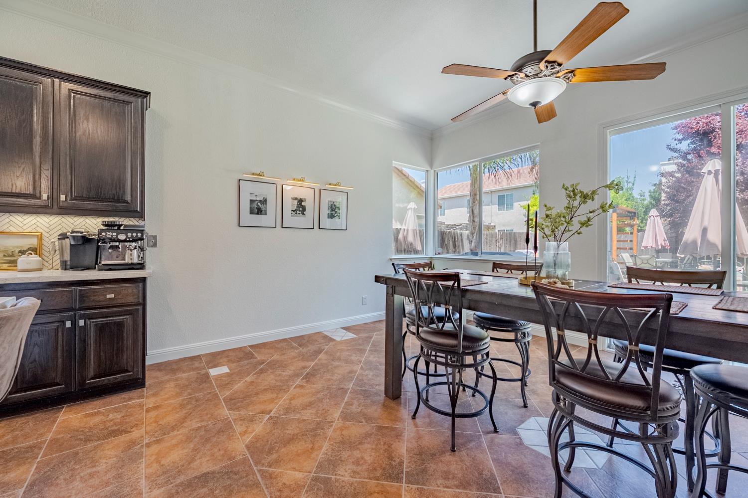 1833 La Quinta Court Merced, CA 95340 - Photo 20 of 55 a view of a dining room with furniture window and outside view
