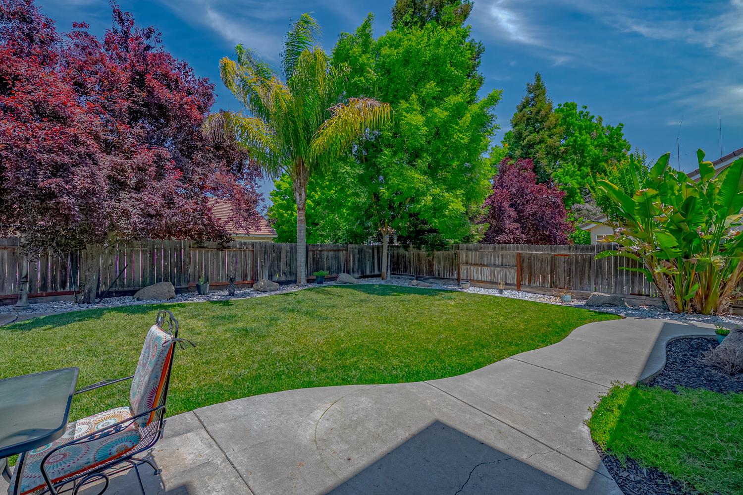 1833 La Quinta Court Merced, CA 95340 - Photo 46 of 55 a view of backyard with wooden fence