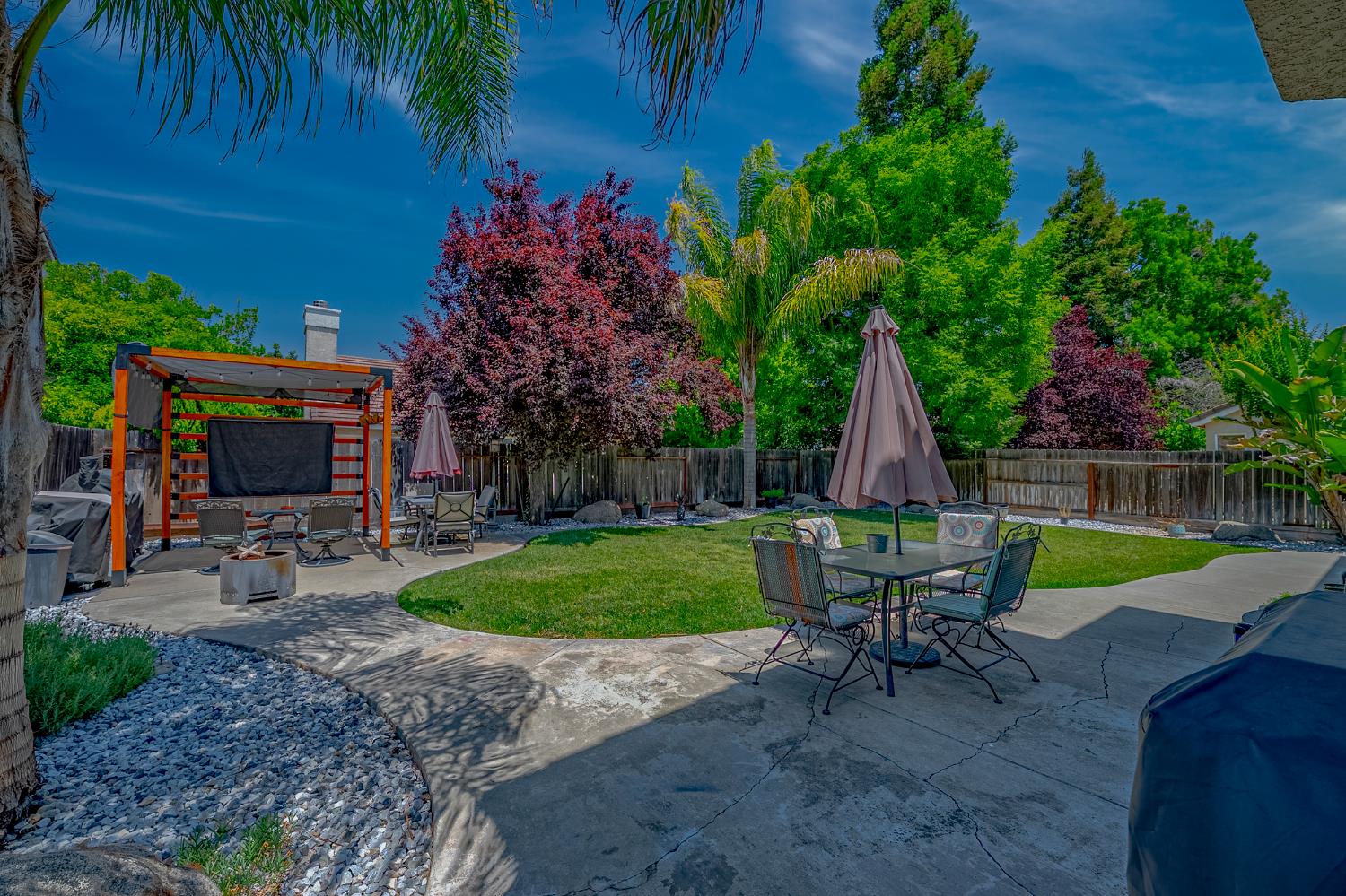 1833 La Quinta Court Merced, CA 95340 - Photo 49 of 55 a view of backyard with outdoor seating and green space