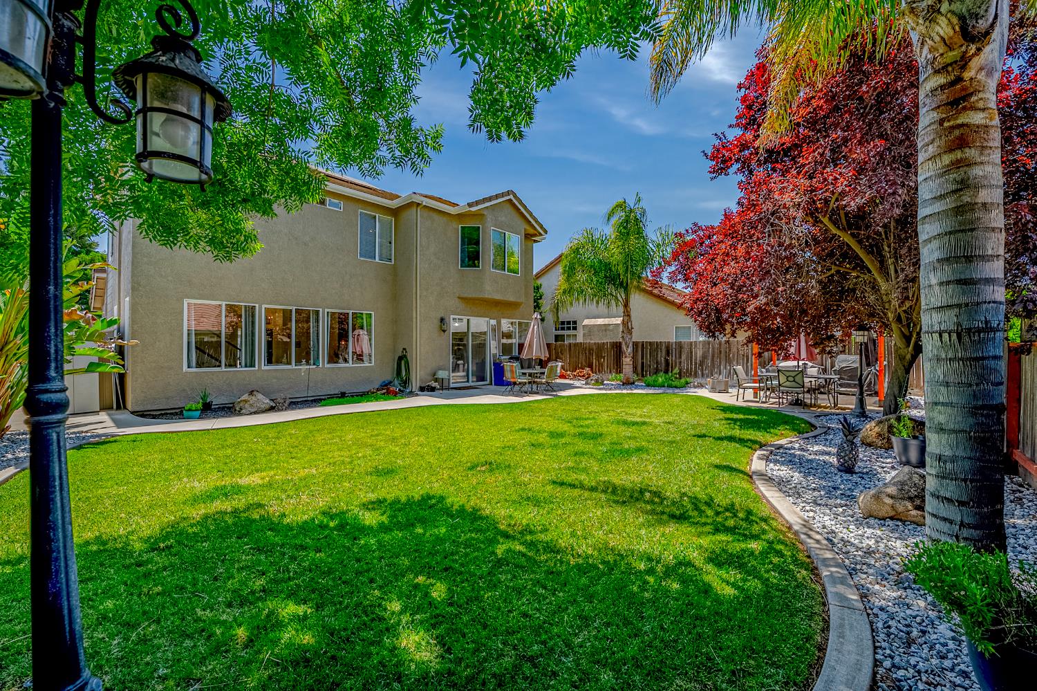 1833 La Quinta Court Merced, CA 95340 - Photo 55 of 55 a view of house with a garden