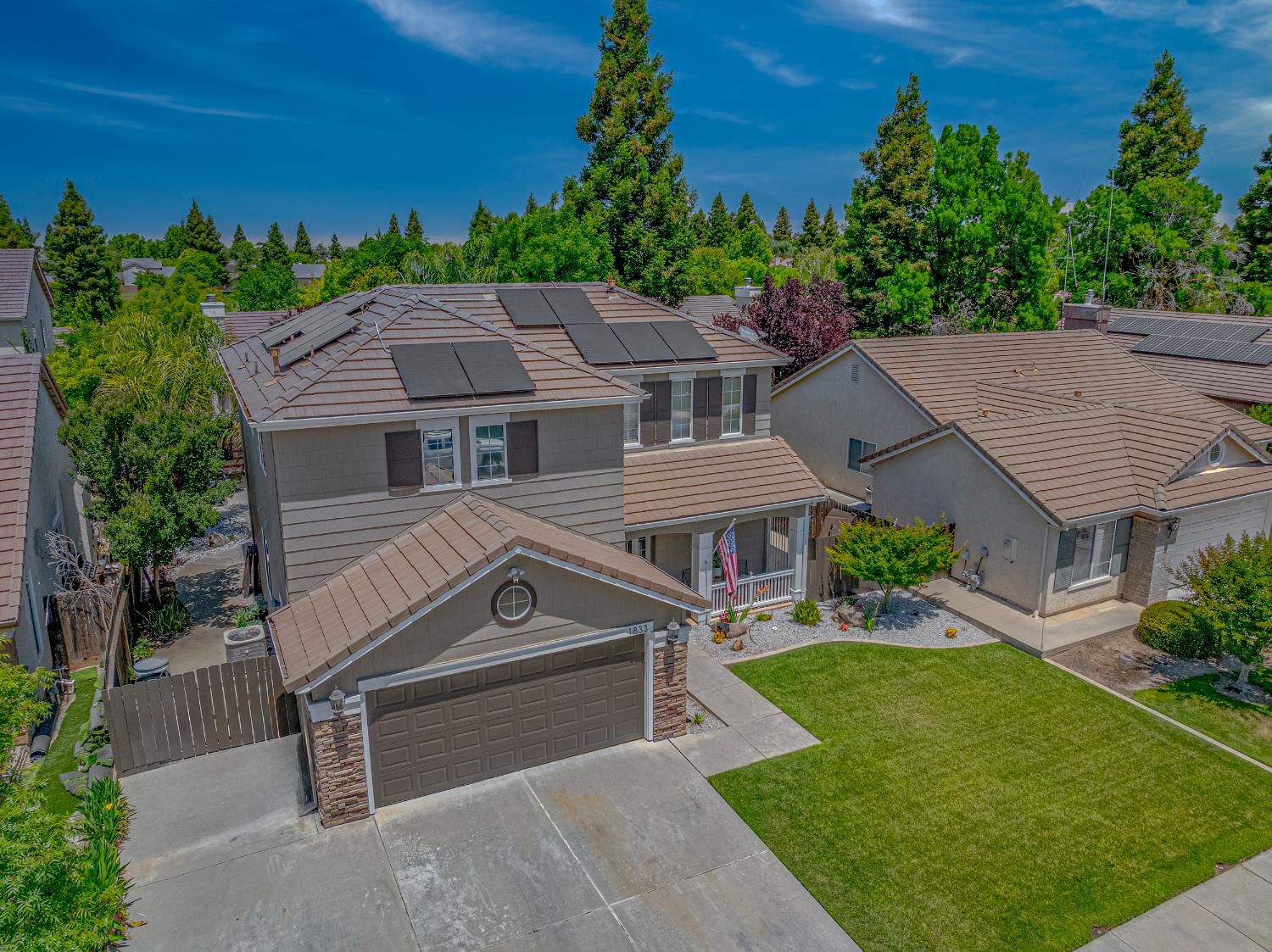 1833 La Quinta Court Merced, CA 95340 - Photo 6 of 55 an aerial view of a house with a yard