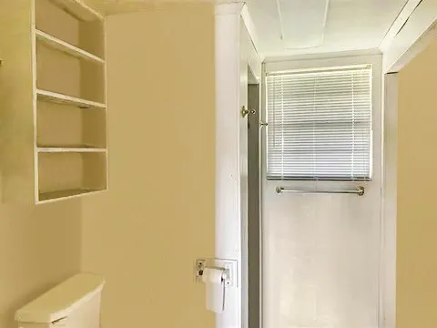 a house with a tree in the background