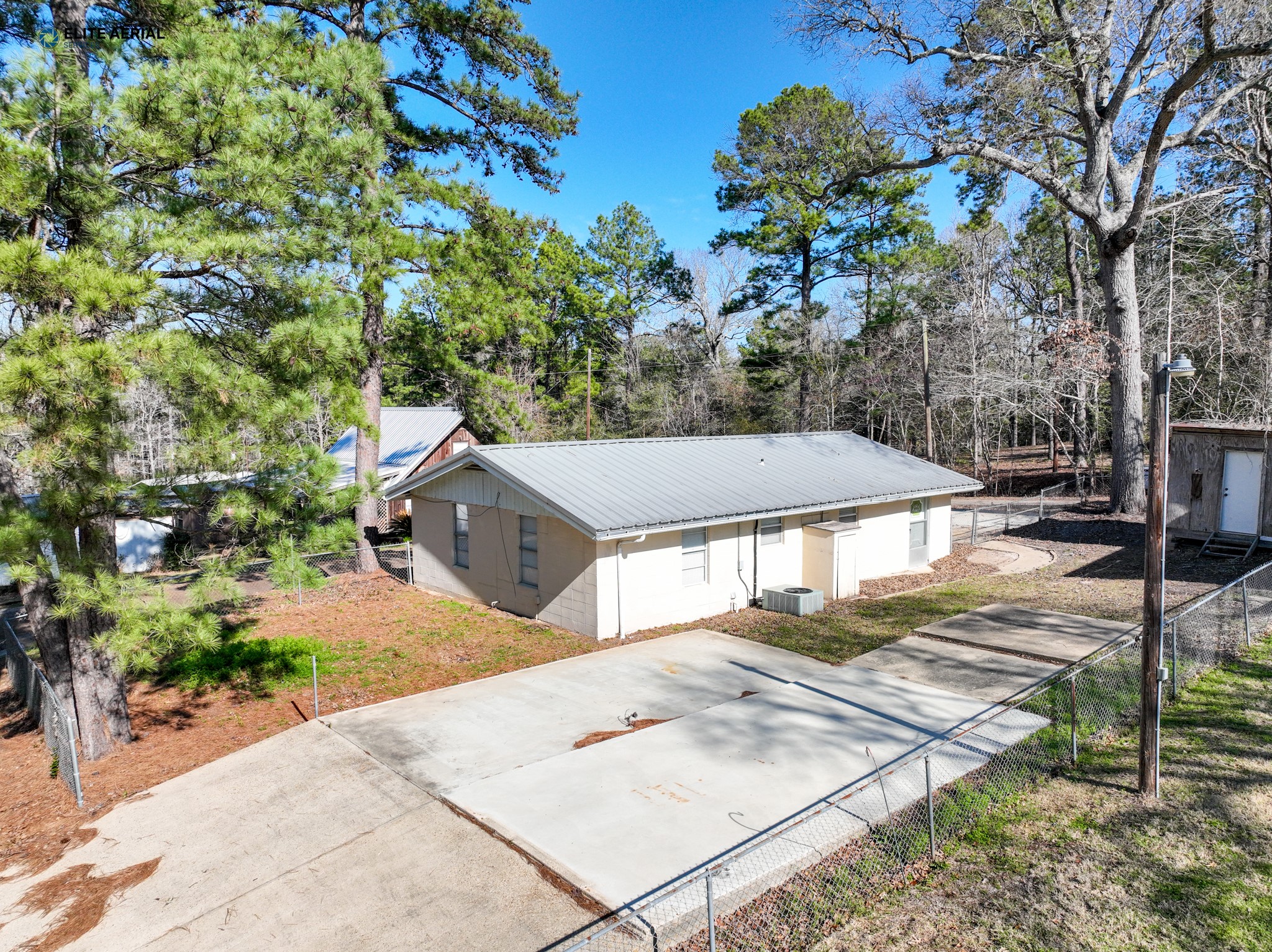 166 County Road 52 Jasper, TX 75951 - Photo 9 of 14 a view of a house with a yard