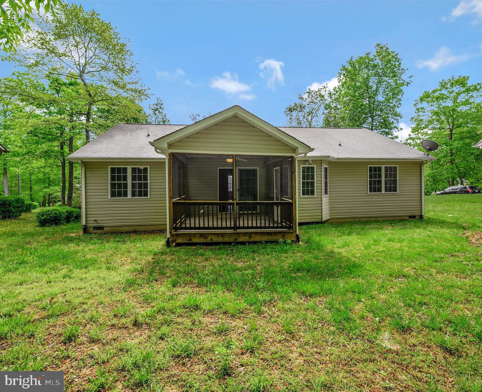 114 Saylers Creek Road Locust Grove, VA 22508 - Photo 23 of 33 View of of the house from the level backyard