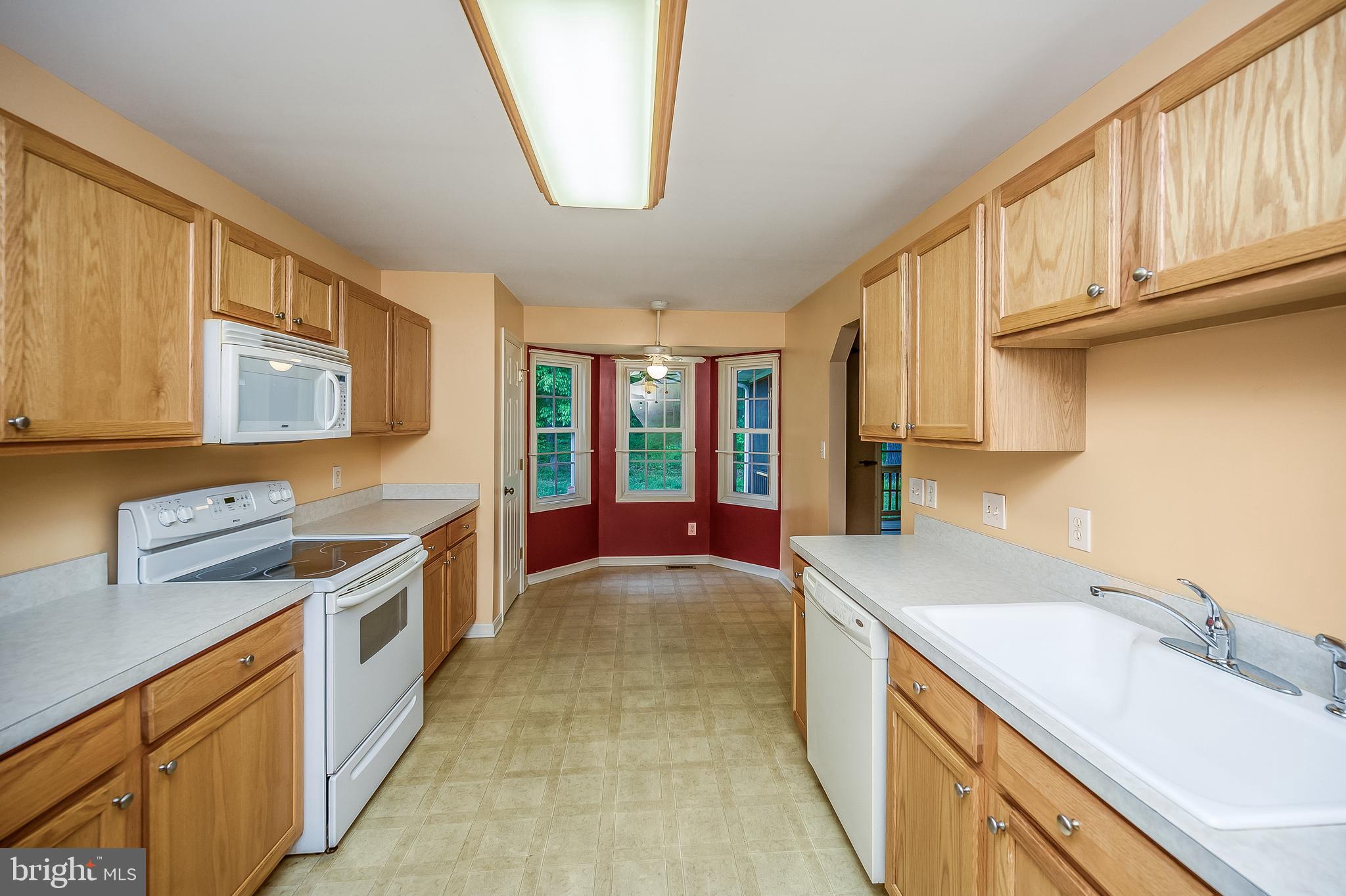 114 Saylers Creek Road Locust Grove, VA 22508 - Photo 6 of 33 Spacious kitchen leading to the breakfast area