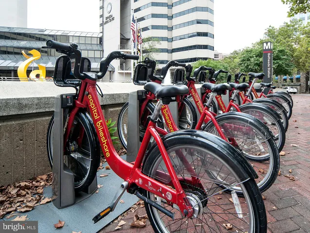 a view of a swimming pool with sitting area
