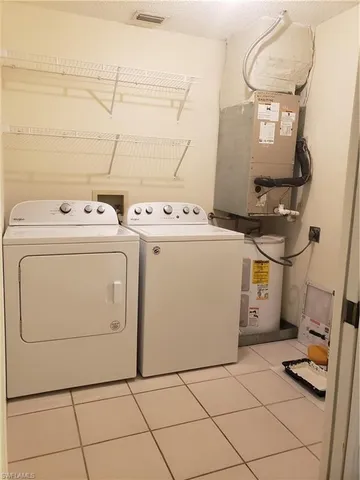 $2,000 | 240 Timber Lake Circle, Unit D202, Naples, FL 34104