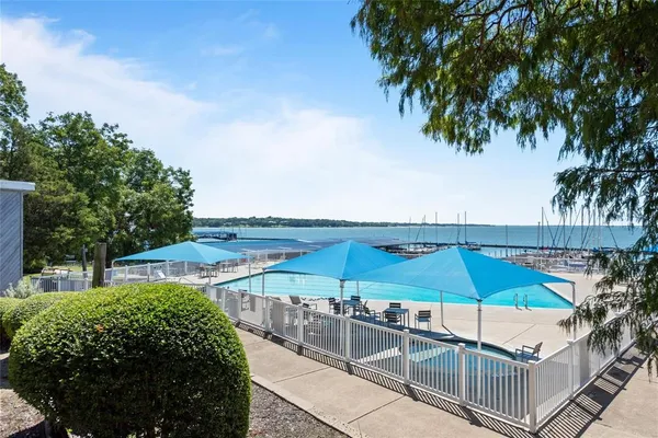 a view of a swimming pool with a patio