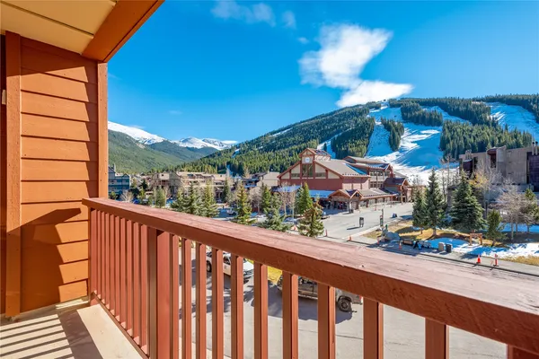 a view of a street from a balcony