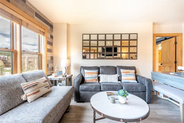 a living room with furniture and a window