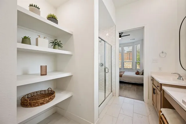 a walk in closet room with a couch