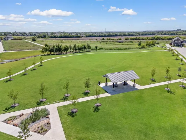 a view of a lake with a big yard