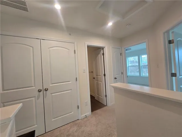 a spacious bathroom with a bathtub and a shower