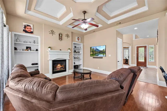 a view of a livingroom with furniture and front door