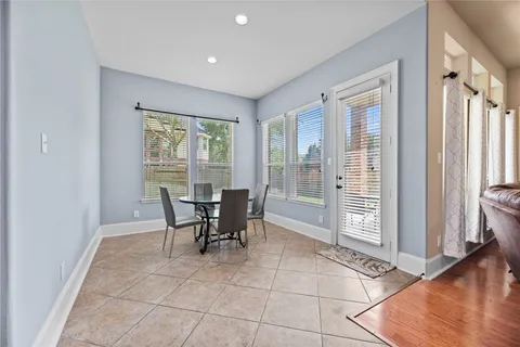 a kitchen that has a sink and a stove in it