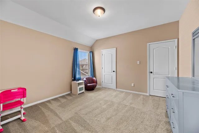 a front view of a house with yard patio and green space