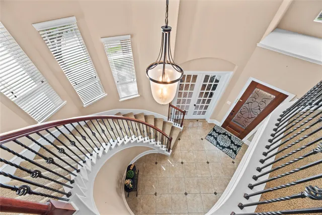 a living room with furniture rug and window
