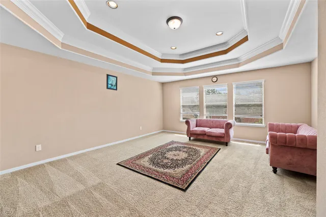 a street sign that is sitting in front of flowers