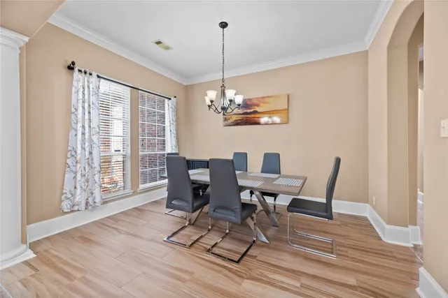 a view of livingroom with workspace and a window