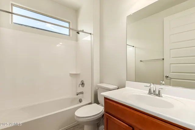 a view of empty room with fan