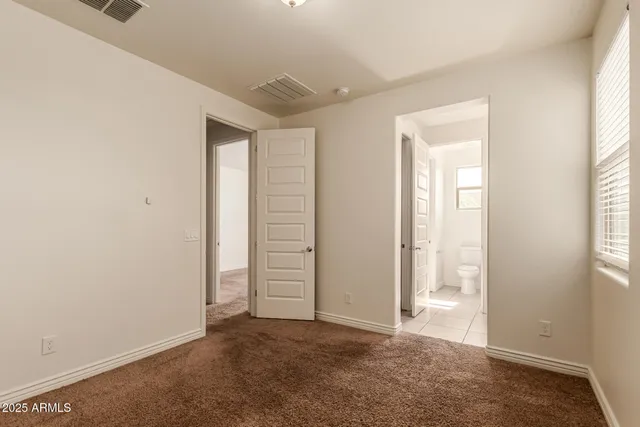 a view of a porch with a bench