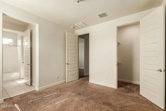 a view of a cafe with sitting area