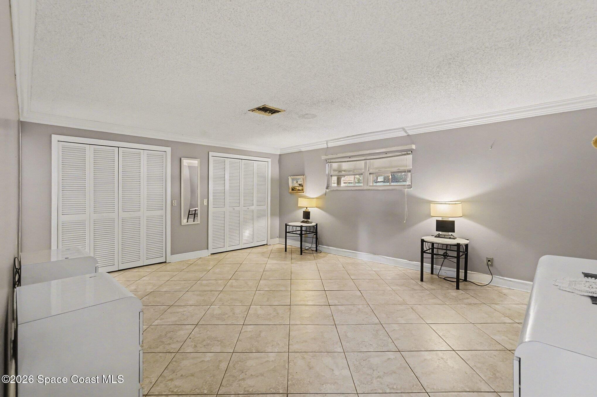 1351 Cherry Hills Road Northeast Palm Bay, FL 32905 - Photo 5 of 15 Primary Suite