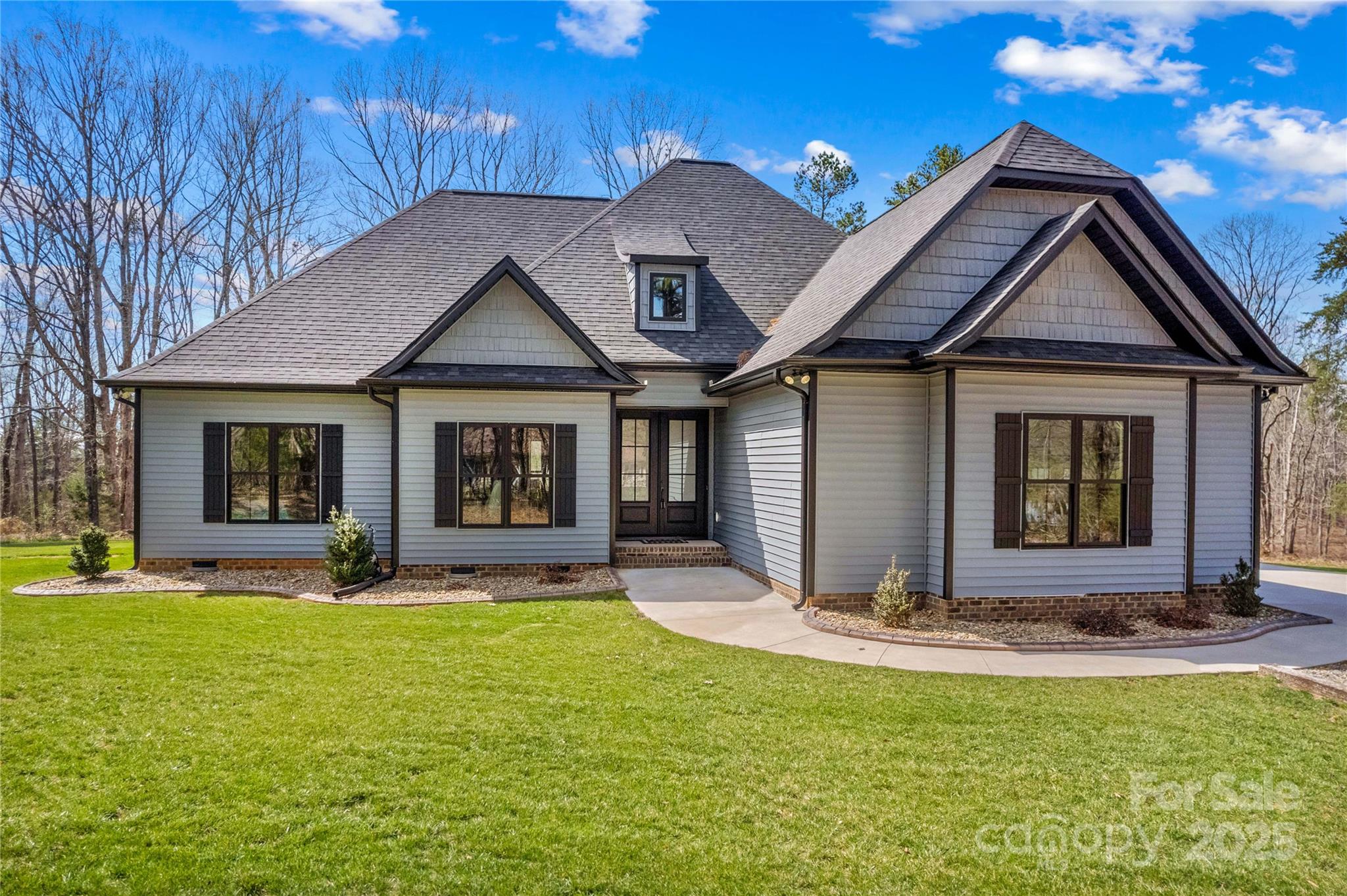 825 Potneck Road Salisbury, NC 28147 - Photo 1 of 40 a front view of a house with a yard