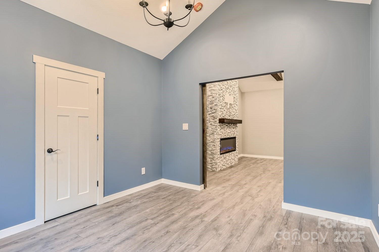 825 Potneck Road Salisbury, NC 28147 - Photo 16 of 40 a view of a hallway with wooden floor and closet