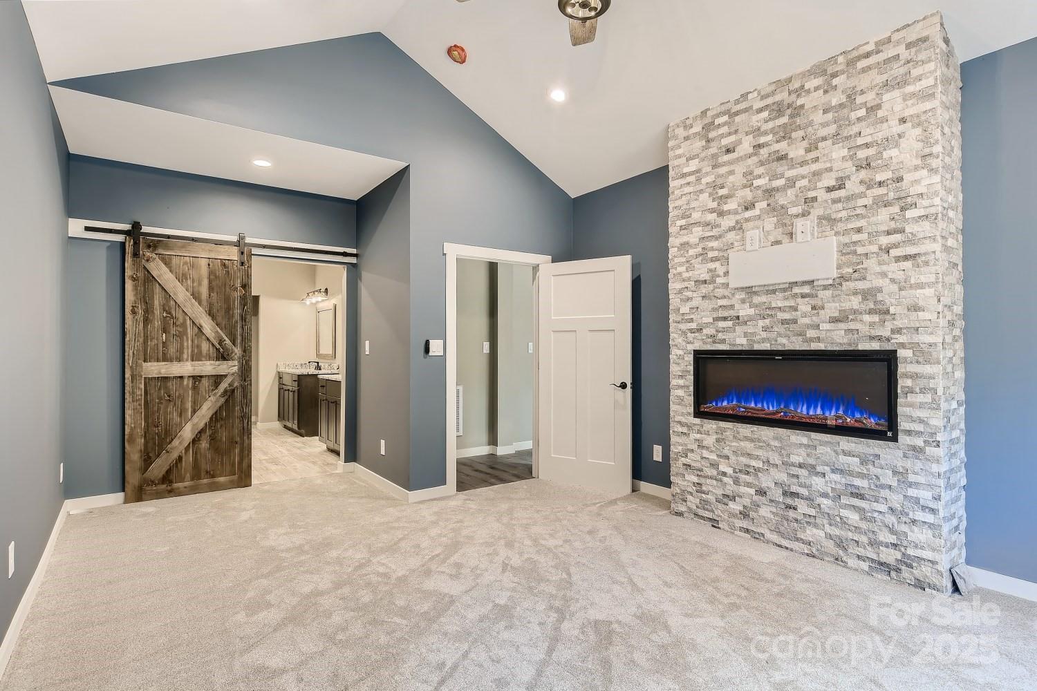 825 Potneck Road Salisbury, NC 28147 - Photo 20 of 40 a view of an empty room and a fireplace