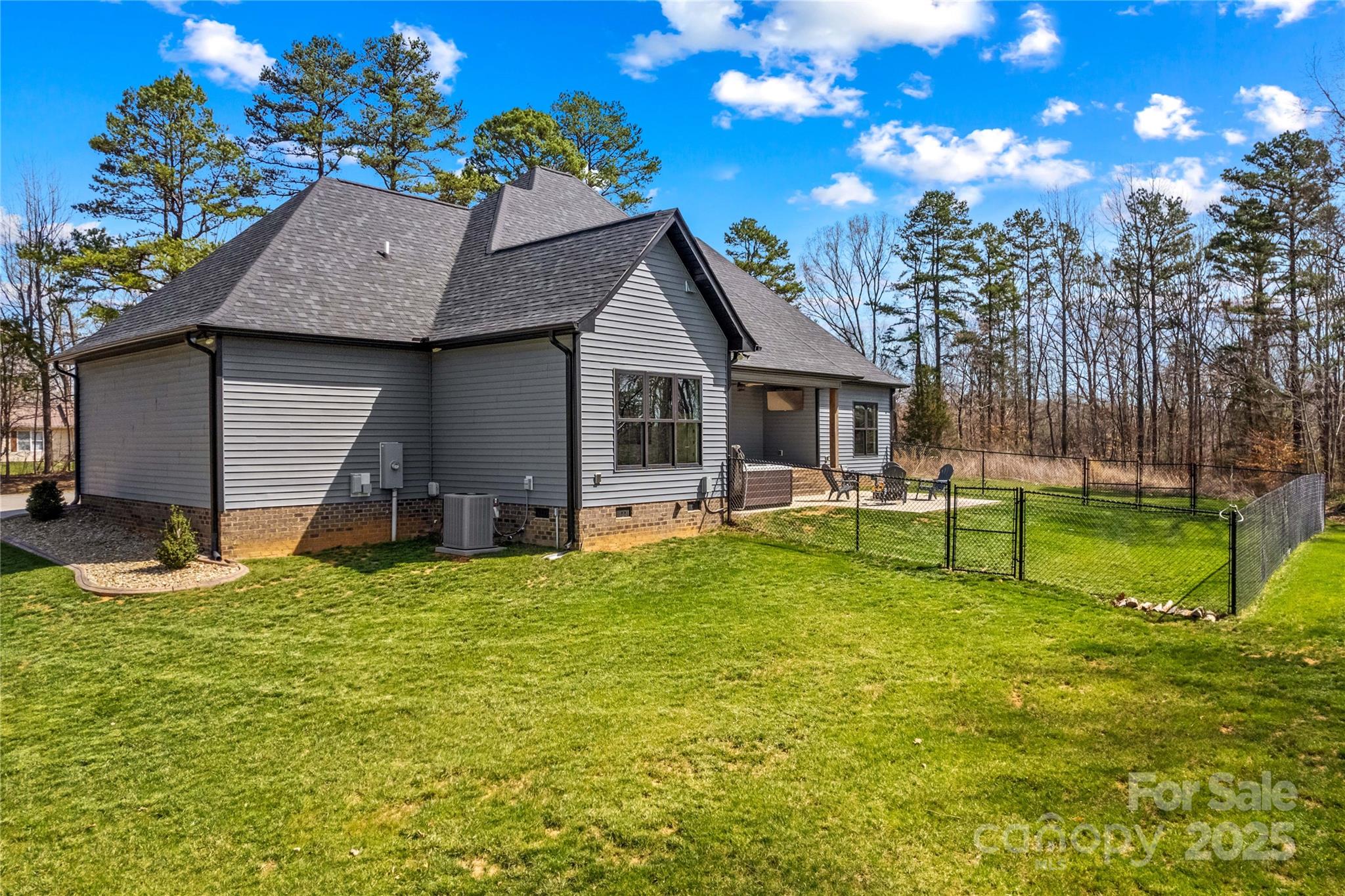 825 Potneck Road Salisbury, NC 28147 - Photo 26 of 40 a house that has garden in front of it