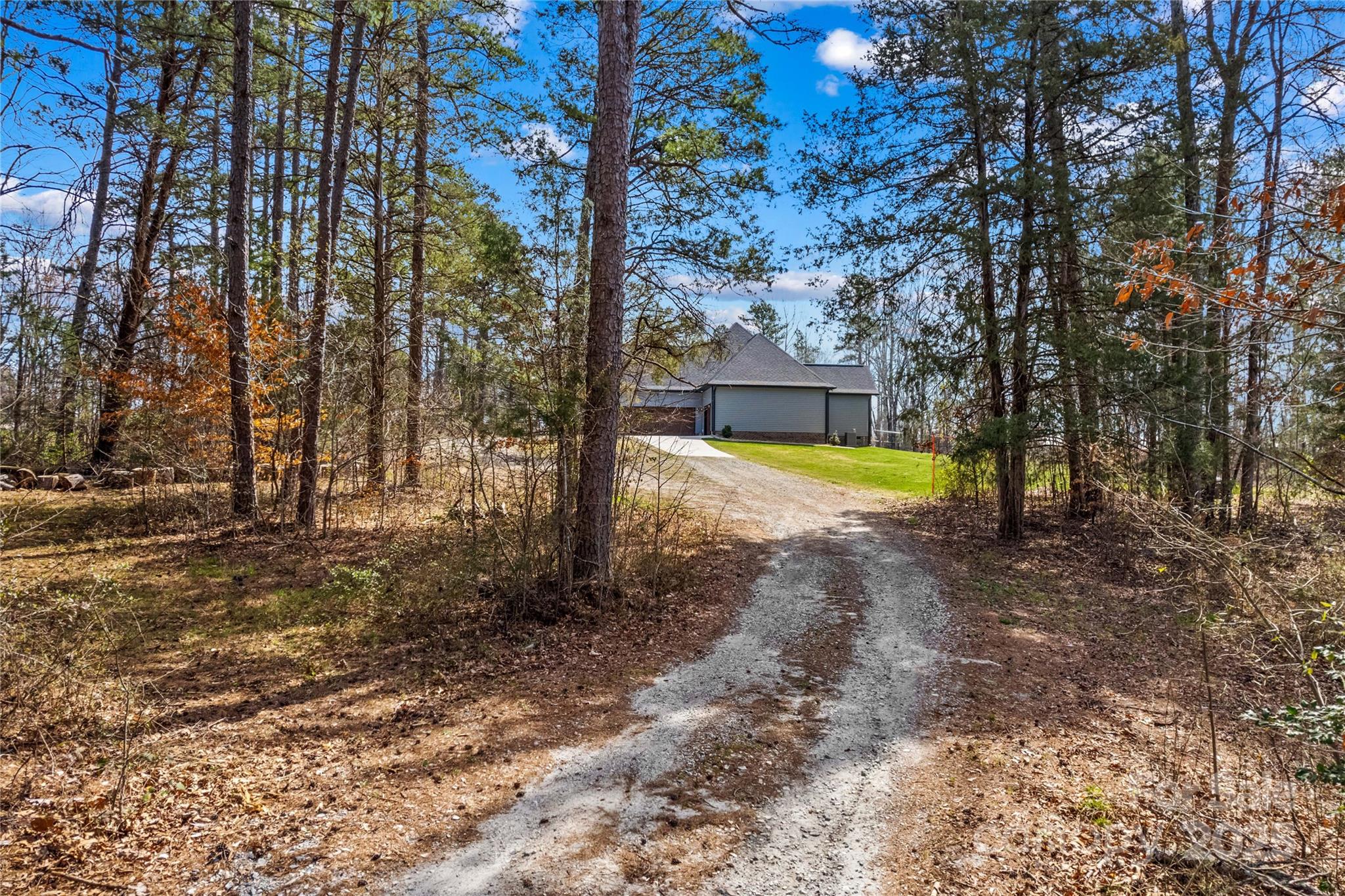 825 Potneck Road Salisbury, NC 28147 - Photo 28 of 40 a view of a backyard with large trees