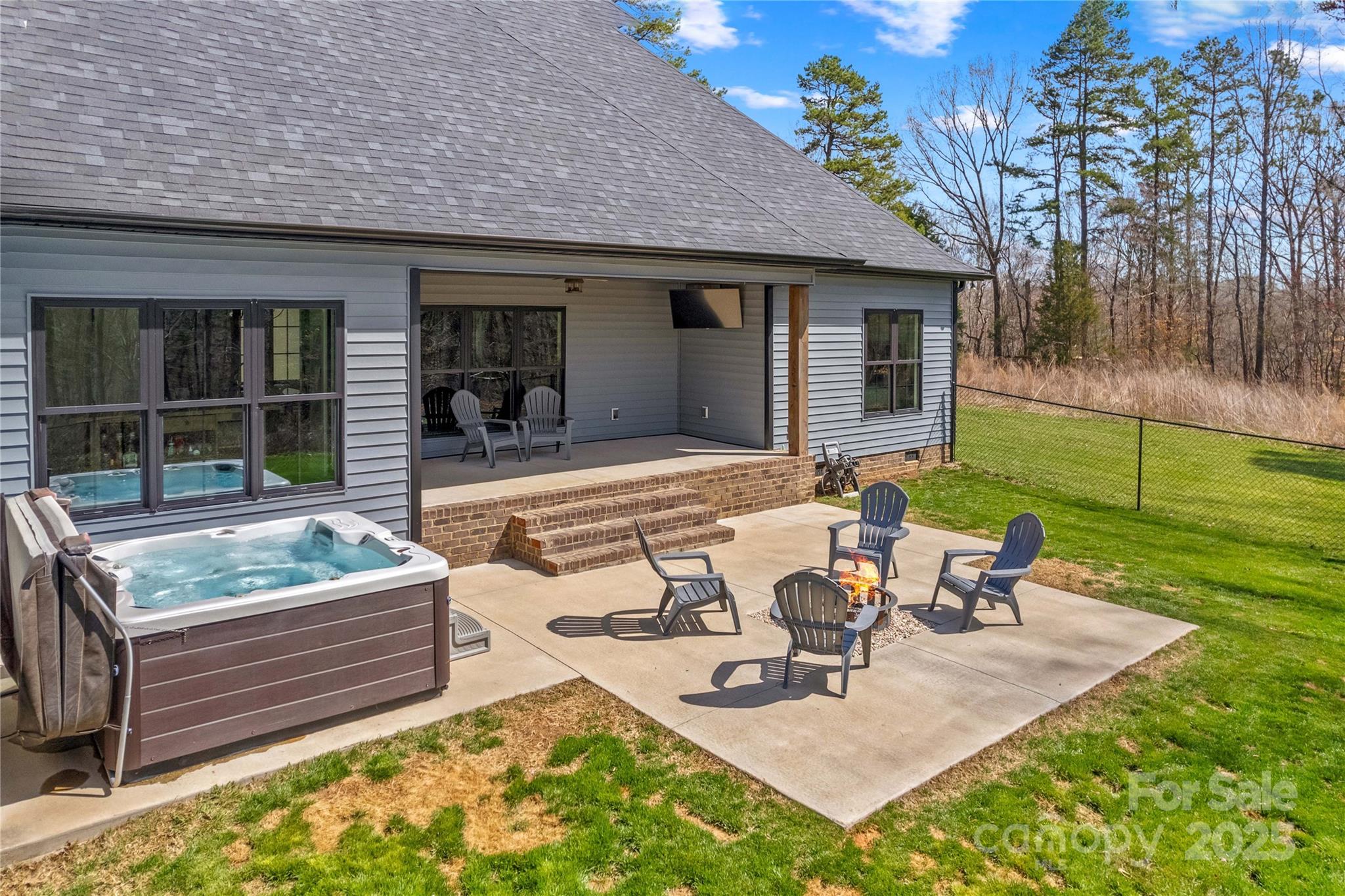 825 Potneck Road Salisbury, NC 28147 - Photo 33 of 40 a view of a house with backyard and sitting area