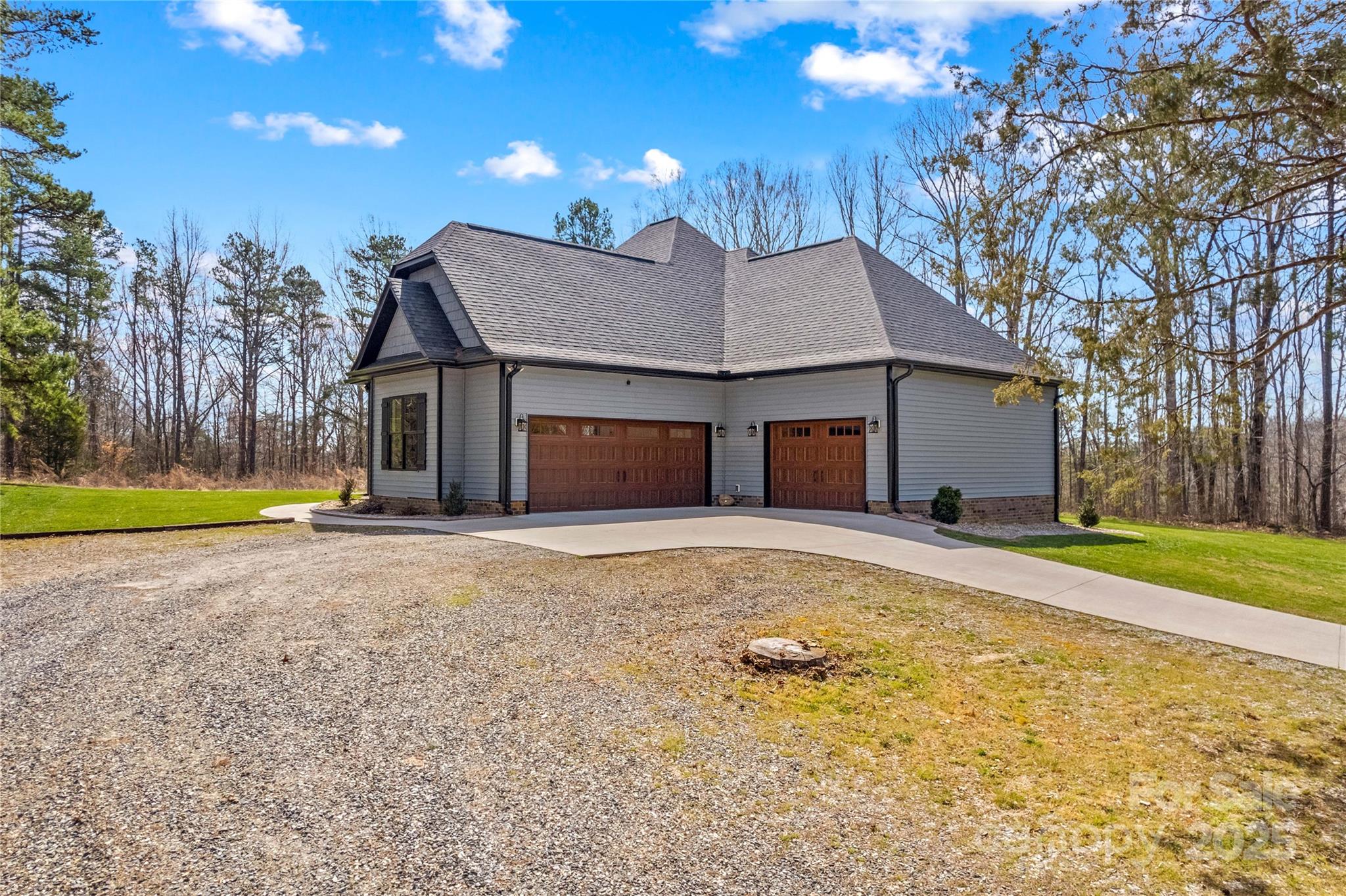 825 Potneck Road Salisbury, NC 28147 - Photo 4 of 40 a view of a house with a yard and tree s