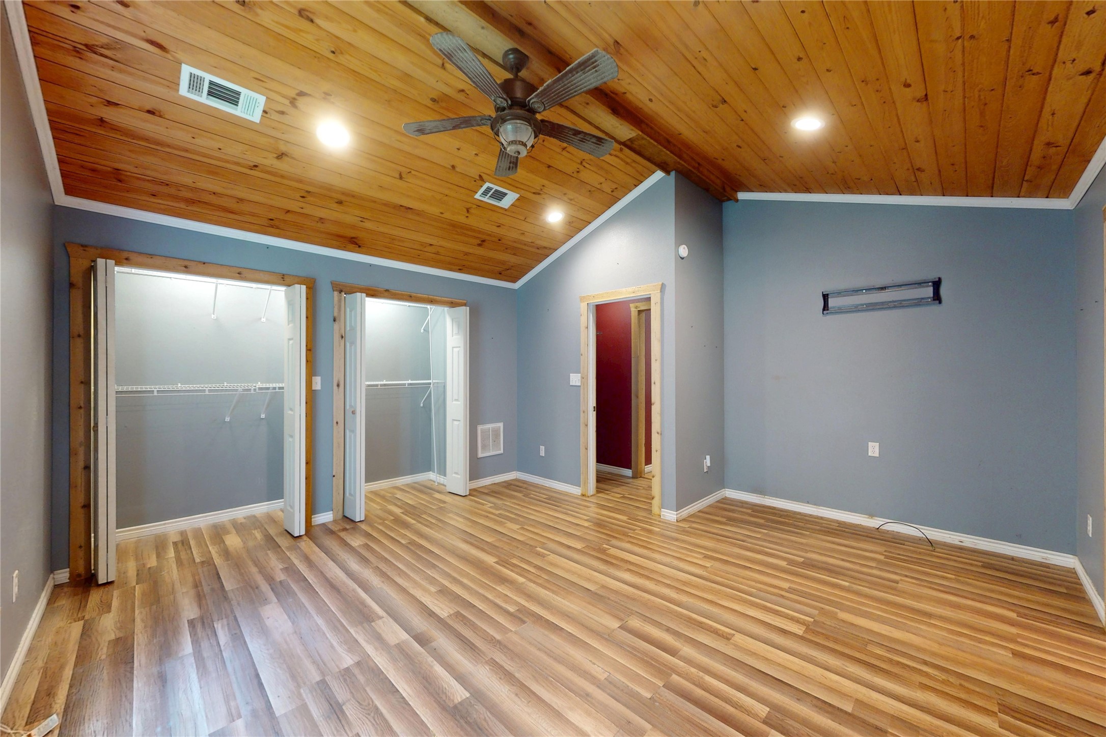 3725 Fm 222 Loop North Coldspring, TX 77331 - Photo 11 of 28 The primary bedroom has stunning vaulted ceilings and plenty of room