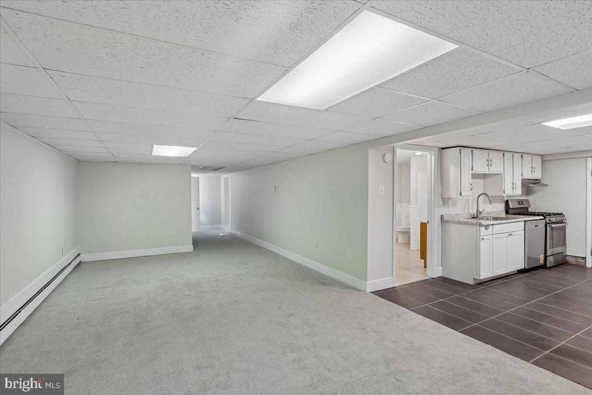 833 Meadow Road Severn, MD 21144 - Photo 33 of 46 Basement Recreation Room Reverse