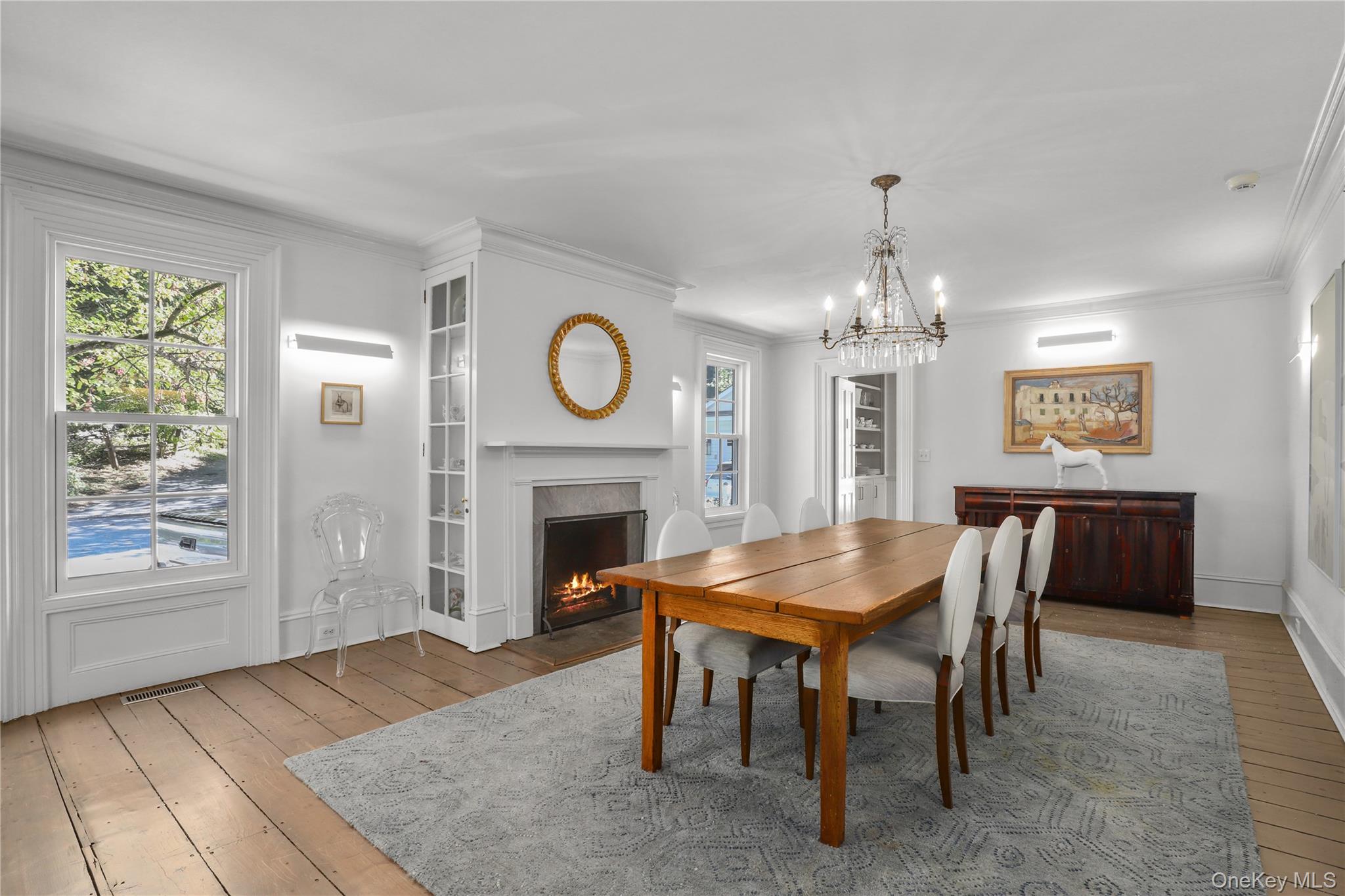 21 Katonahs Wood Road Katonah, NY 10536 - Photo 12 of 34 a view of a dining room with furniture window and wooden floor