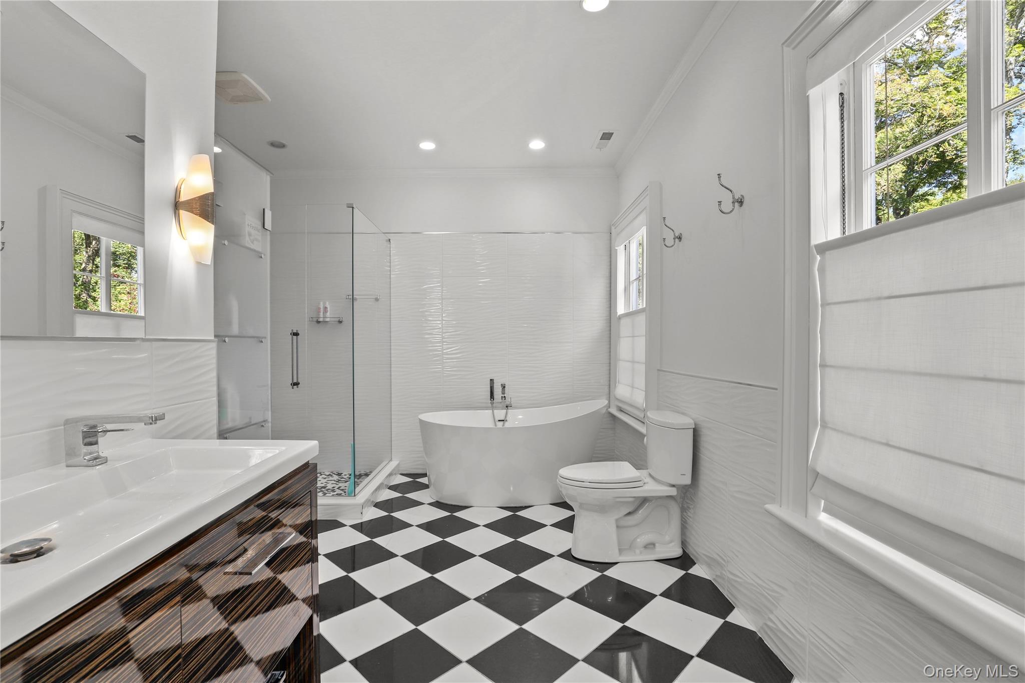 21 Katonahs Wood Road Katonah, NY 10536 - Photo 20 of 34 a bathroom with a sink toilet a mirror and shower