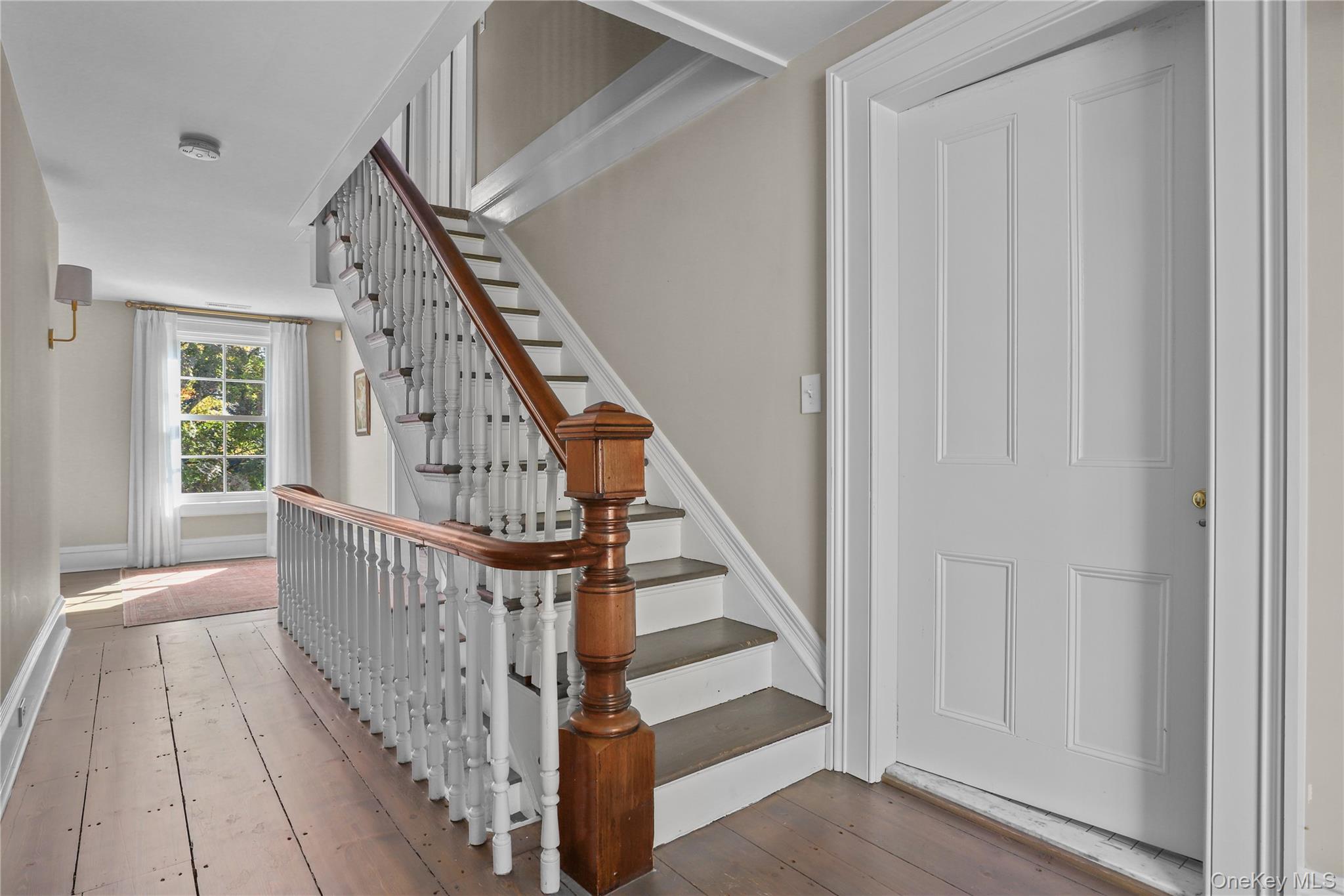 21 Katonahs Wood Road Katonah, NY 10536 - Photo 25 of 34 a view of staircase with wooden floor and white walls