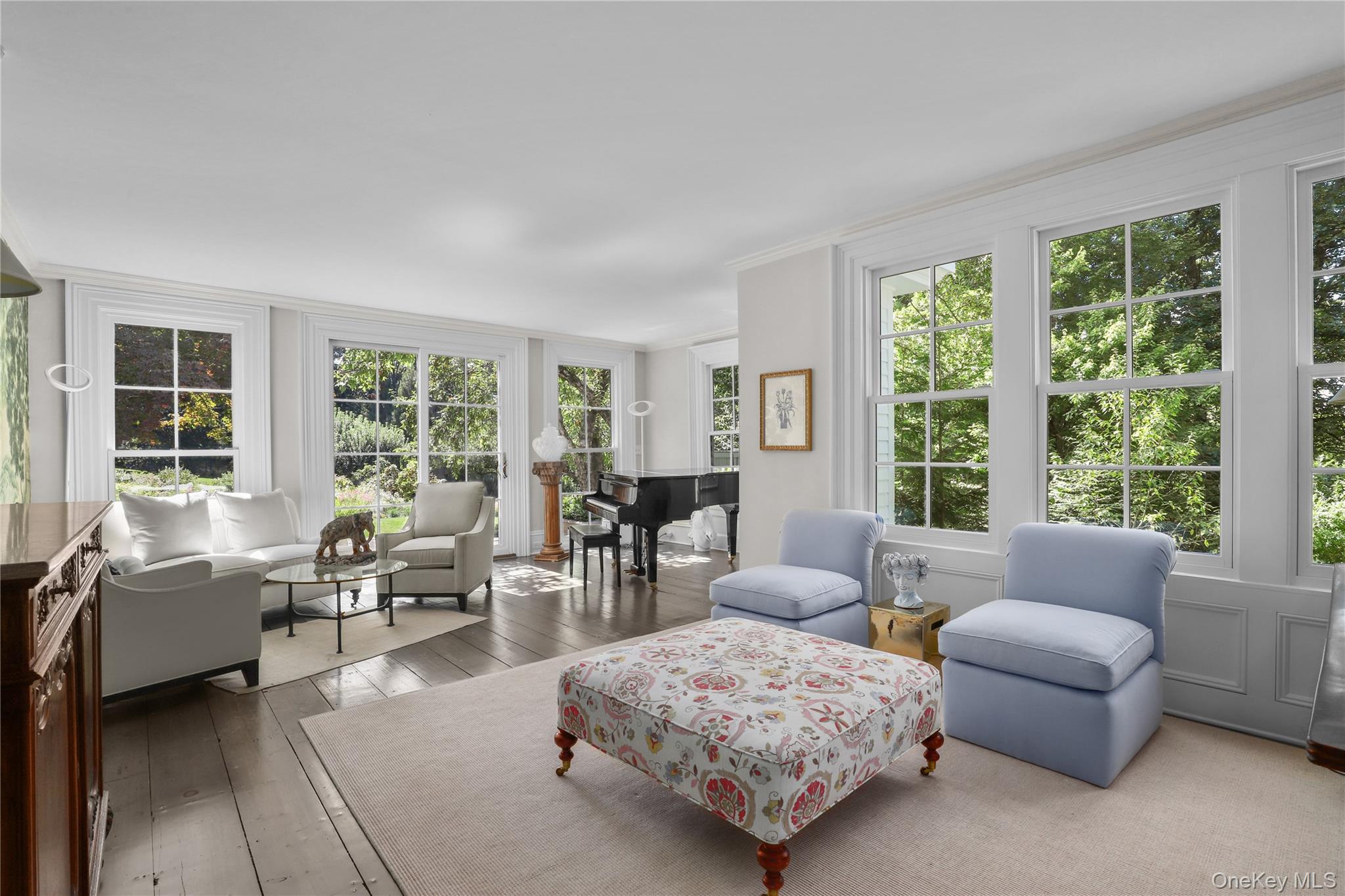 21 Katonahs Wood Road Katonah, NY 10536 - Photo 9 of 34 a living room with furniture and large windows