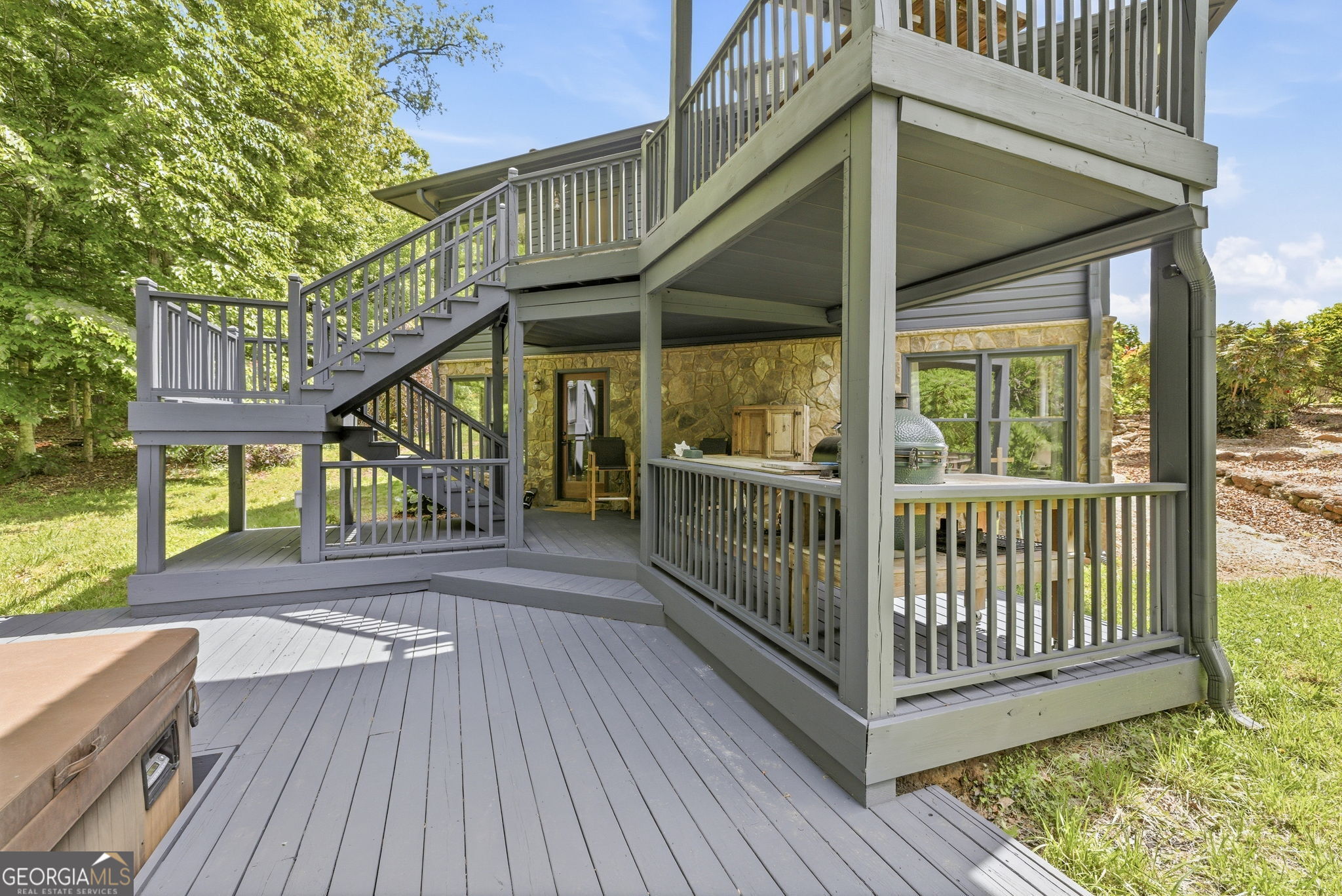 5134 Highway 17 Clarkesville, GA 30523 - Photo 3 of 96 Main level is optimal for Al Fresco dining, lower for de-stressing in hot tub.