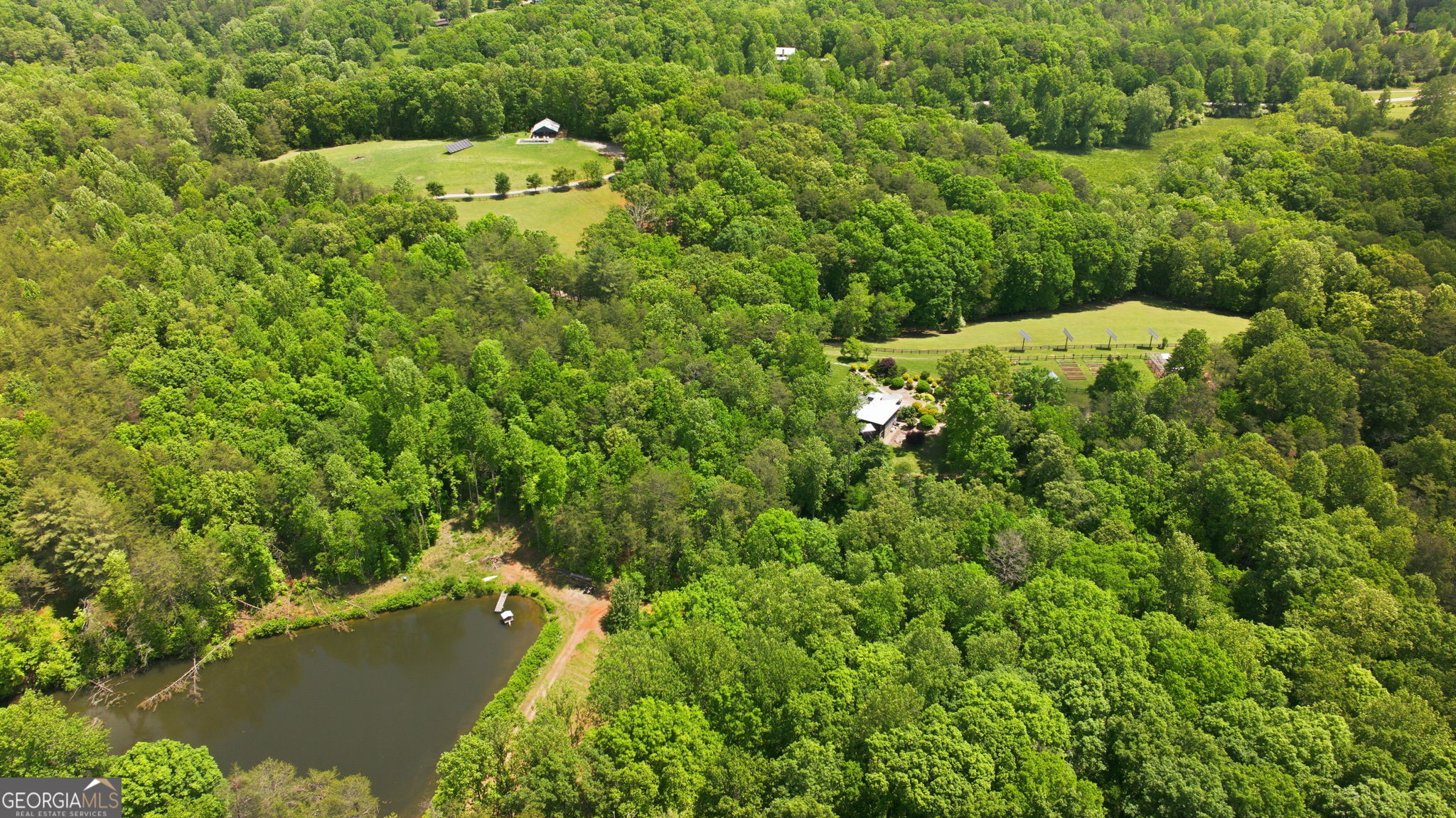 5134 Highway 17 Clarkesville, GA 30523 - Photo 74 of 96 Aerial perspective of the pond, homesite and cottage