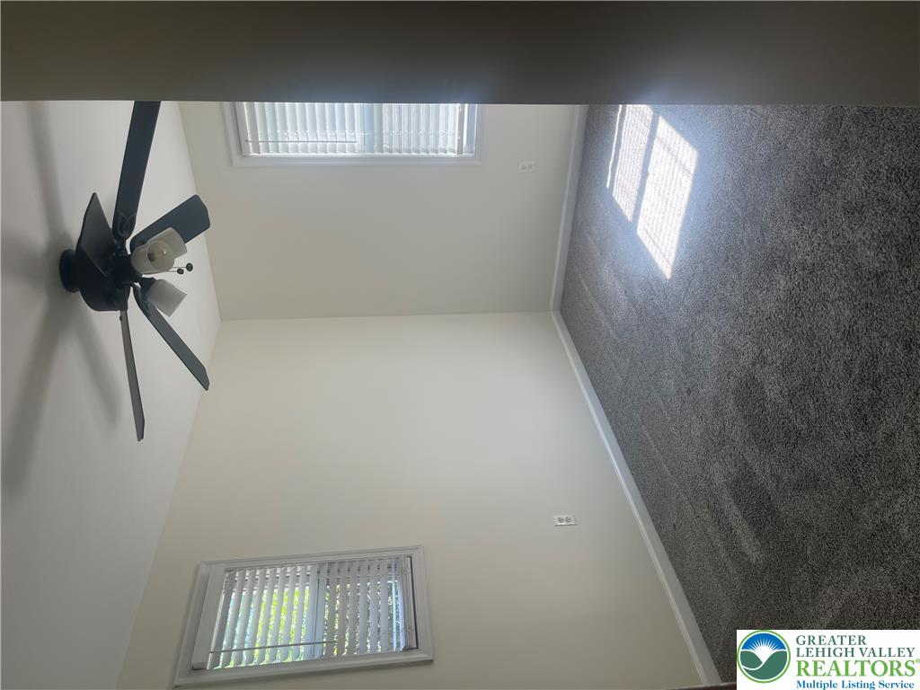 1839 Willow Park Road Bethlehem, PA 18020 - Photo 13 of 35 Comfortable carpet and a ceiling fan create a relaxing atmosphere.