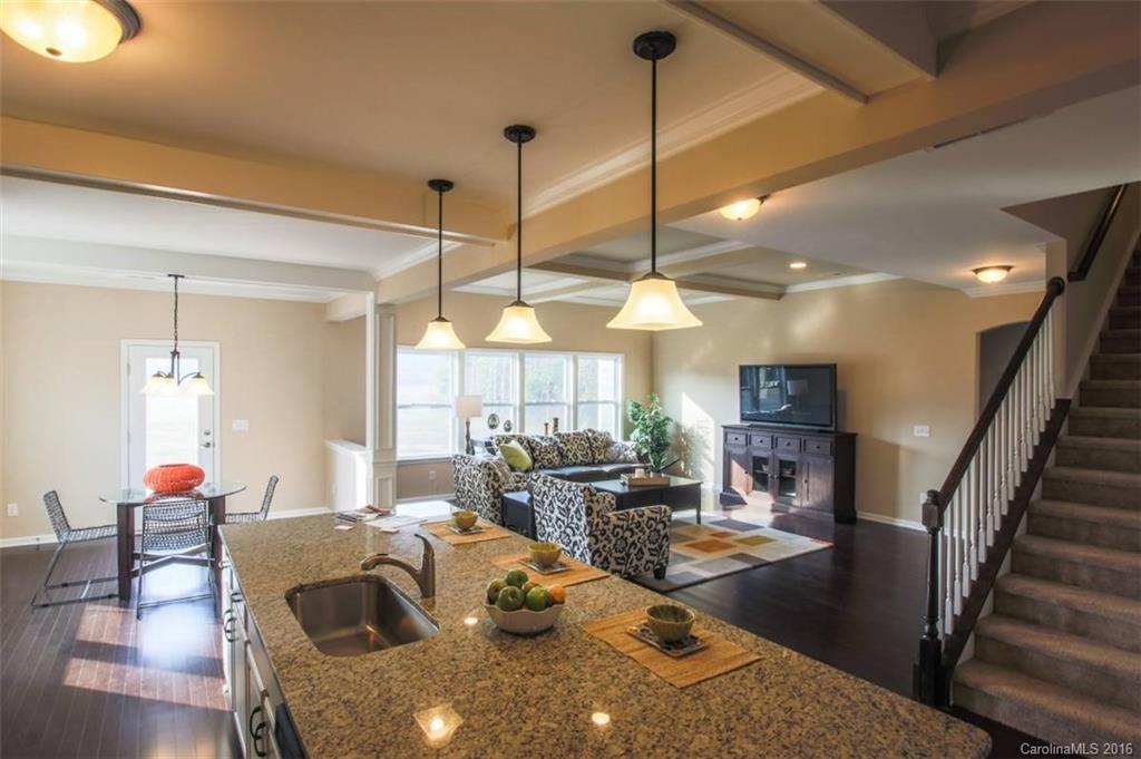 3142 Amaranth Drive, Unit 481 Fort Mill, SC 29708 - Photo 14 of 24 a very nice looking dining room with a table and chairs