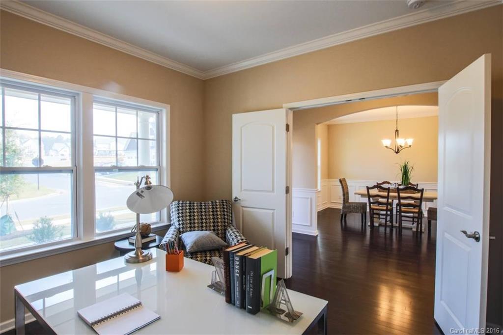 3142 Amaranth Drive, Unit 481 Fort Mill, SC 29708 - Photo 5 of 24 a living room with furniture and wooden floor