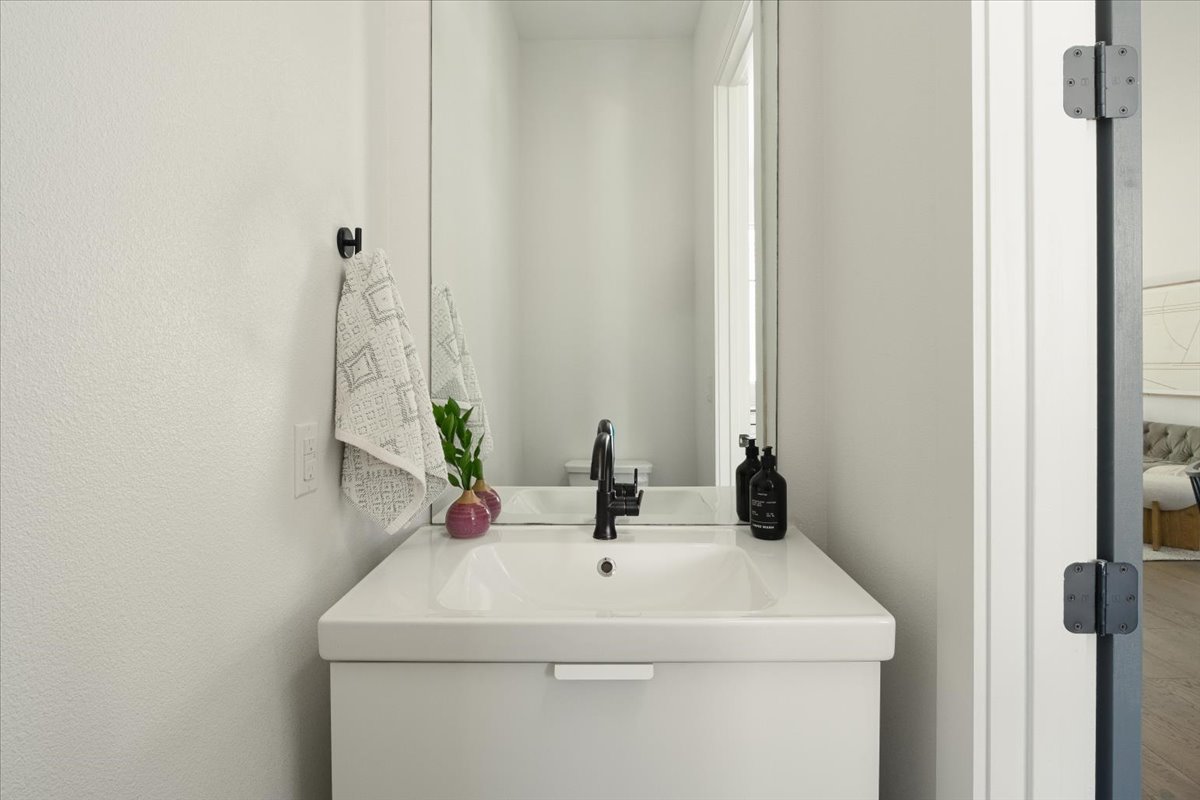 3700 Clawson Road, Unit 301 Austin, TX 78704 - Photo 18 of 35 Powder room with vanity on second level