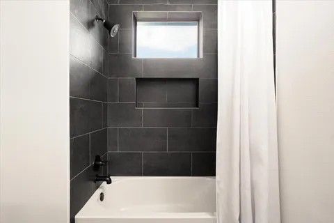 a bathroom with a bathtub